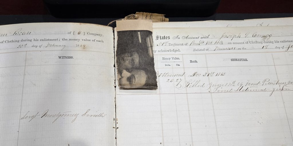 Here is one of the first newspaper bookmarks we found in this Civil War clothing ledger. You can see more scraps of newspaper further into the book. Our angry archivist was not happy to find these....