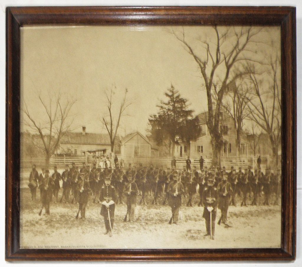 Photograph of Company K, 51st Massachusetts Infantry at Evans Mill. The photograph is described in a letter written by Gustavus Williams on April 9, 1863. 